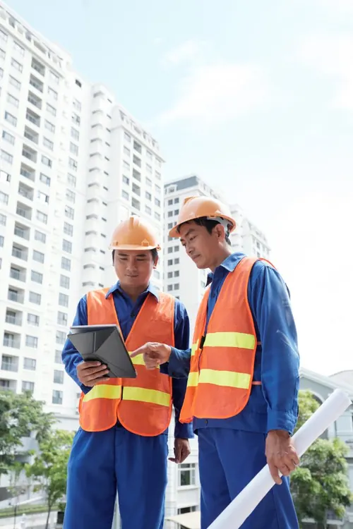 Construction professionals with tablet
